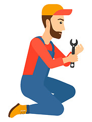 Image showing Repairman holding spanner.