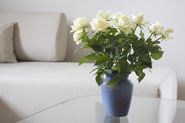 Image showing White roses in a living room