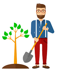 Image showing Man plants tree.