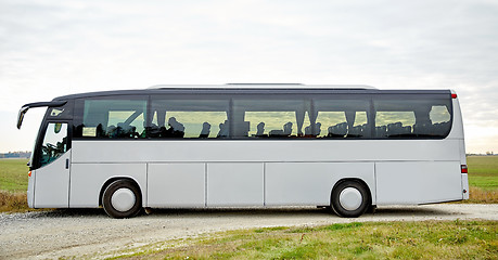 Image showing tour bus driving outdoors