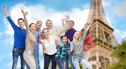 Image showing group of happy people having fun over eiffel tower