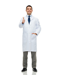 Image showing smiling doctor in white coat showing thumbs up