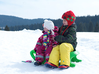 Image showing portrait of boy and baby girl on winter vacation