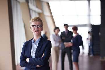 Image showing business people group, woman in front  as team leader