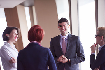 Image showing business people group on meeting at modern bright office