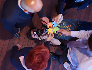 Image showing assembling jigsaw puzzle