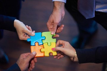 Image showing assembling jigsaw puzzle