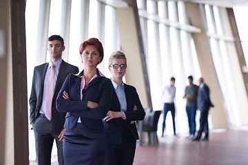 Image showing diverse business people group with redhair  woman in front