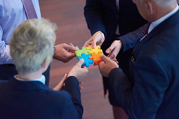 Image showing assembling jigsaw puzzle