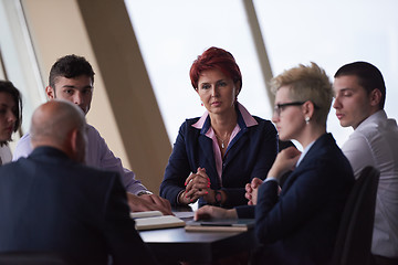 Image showing business people group on meeting at modern bright office