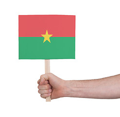 Image showing Hand holding small card - Flag of Burkina Faso