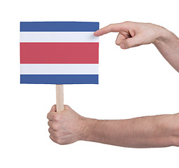 Image showing Hand holding small card - Flag of Costa Rica