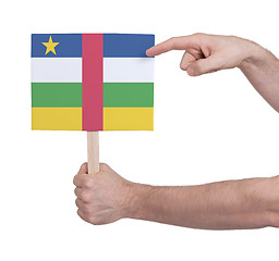 Image showing Hand holding small card - Flag of Central African Republic