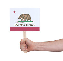 Image showing Hand holding small card - Flag of California