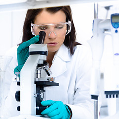 Image showing Young chemist in the laboratory.