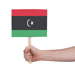 Image showing Hand holding small card - Flag of Libya