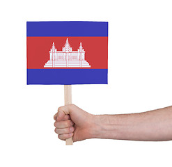 Image showing Hand holding small card - Flag of Cambodia