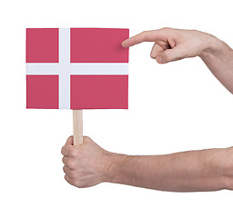 Image showing Hand holding small card - Flag of Denmark