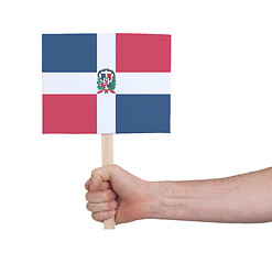 Image showing Hand holding small card - Flag of Dominican Republic