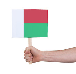 Image showing Hand holding small card - Flag of Madagascar