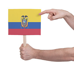 Image showing Hand holding small card - Flag of Ecuador