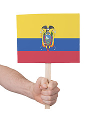 Image showing Hand holding small card - Flag of Ecuador