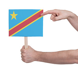 Image showing Hand holding small card - Flag of Congo