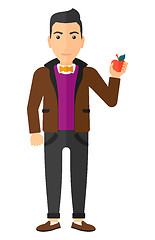 Image showing Man holding apple.