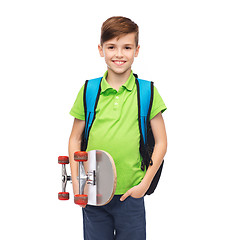 Image showing happy stdent boy with backpack and skateboard