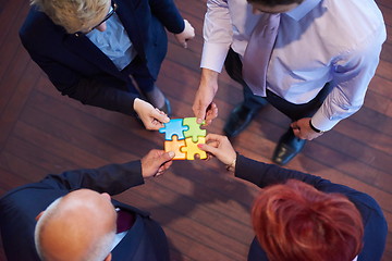 Image showing assembling jigsaw puzzle