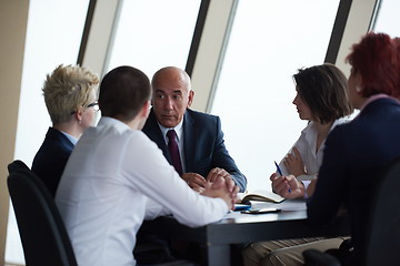 Image showing business people group on meeting at modern bright office