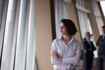 Image showing business people group, woman in front  as team leader