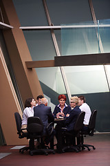 Image showing business people group on meeting at modern bright office