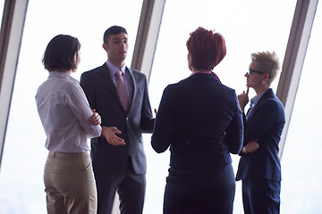 Image showing business people group on meeting at modern bright office