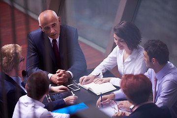 Image showing business people group on meeting at modern bright office