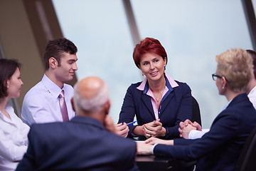 Image showing business people group on meeting at modern bright office