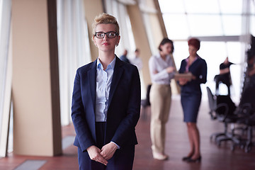 Image showing business people group, woman in front  as team leader