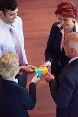 Image showing assembling jigsaw puzzle