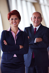 Image showing diverse business people group with redhair  woman in front