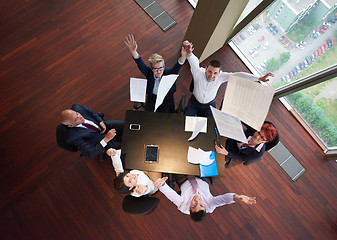 Image showing top view of business people group throwing dociments in air