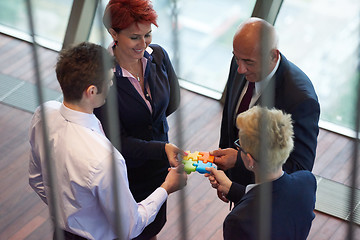 Image showing assembling jigsaw puzzle