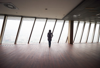 Image showing young successful woman in penthouse apartment