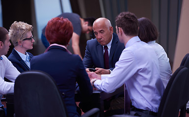 Image showing business people group on meeting at modern bright office