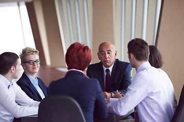 Image showing business people group on meeting at modern bright office