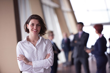 Image showing business people group, woman in front  as team leader