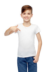 Image showing happy boy pointing finger to his white t-shirt