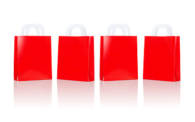 Image showing many blank red shopping bags