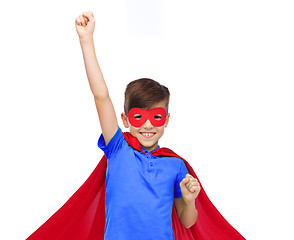 Image showing boy in red super hero cape and mask showing fists