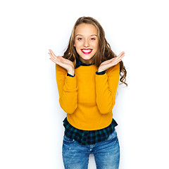 Image showing happy young woman or teen girl in casual clothes