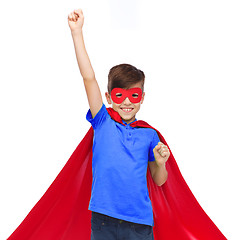 Image showing boy in red super hero cape and mask showing fists